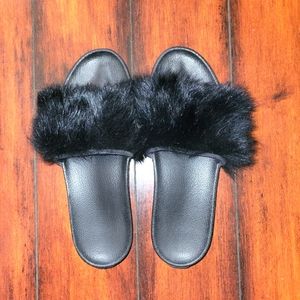 Black faux fur women's UGG slides